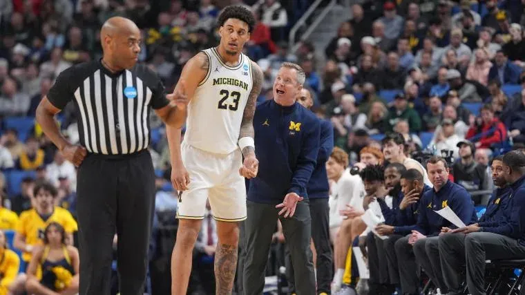 Embauche de Dusty May : Impact sur la Draft NBA et les cibles du Michigan